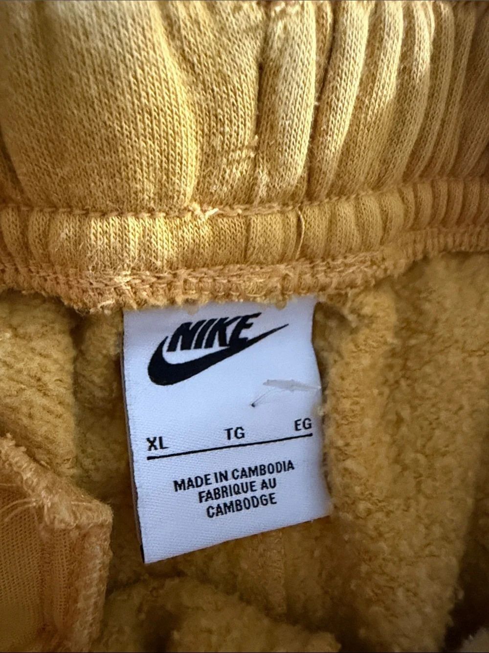 Nike soft yellow